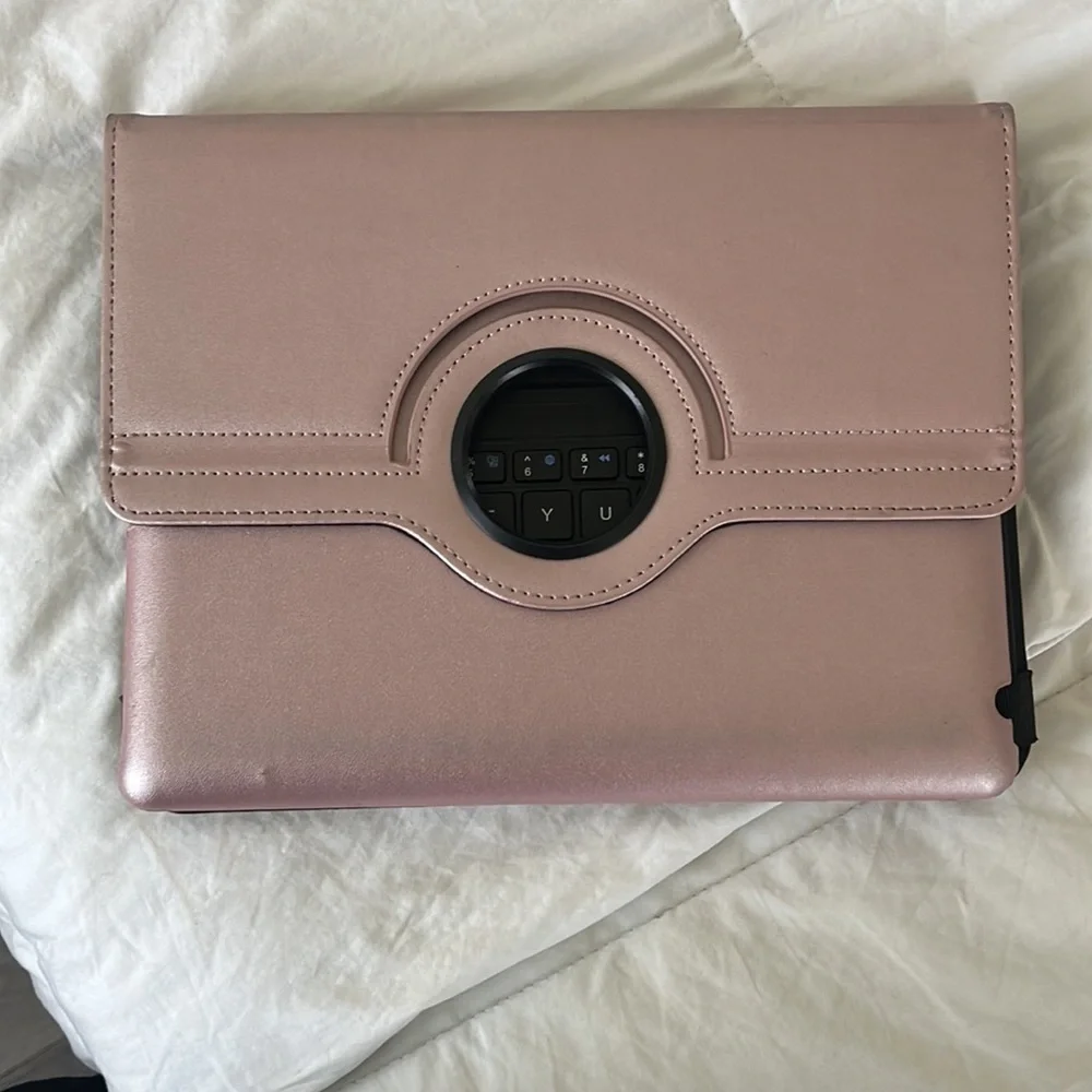Rose gold iPad case with keyboard.